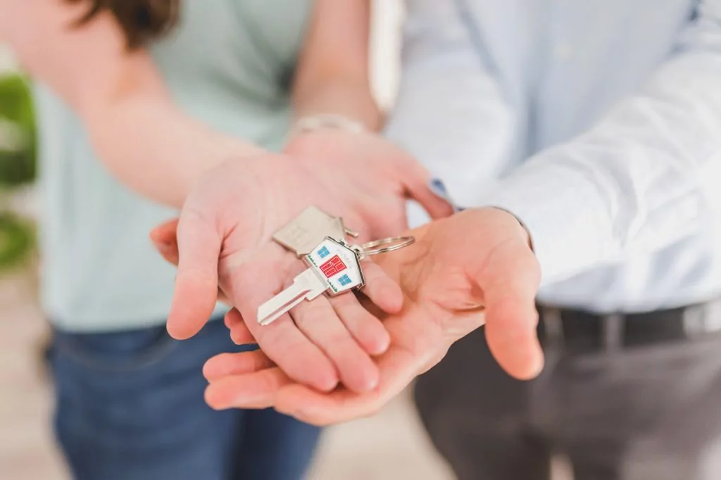 couple holding house keys